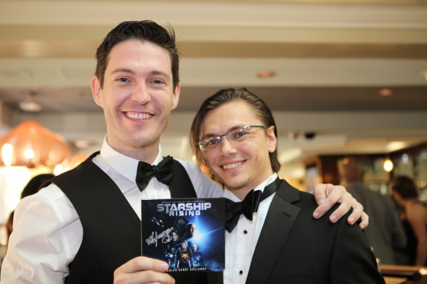 Actor Darren Jacobs holding his signed copy of the Award winning soundtrack with Composer Charles-Henri Avelange